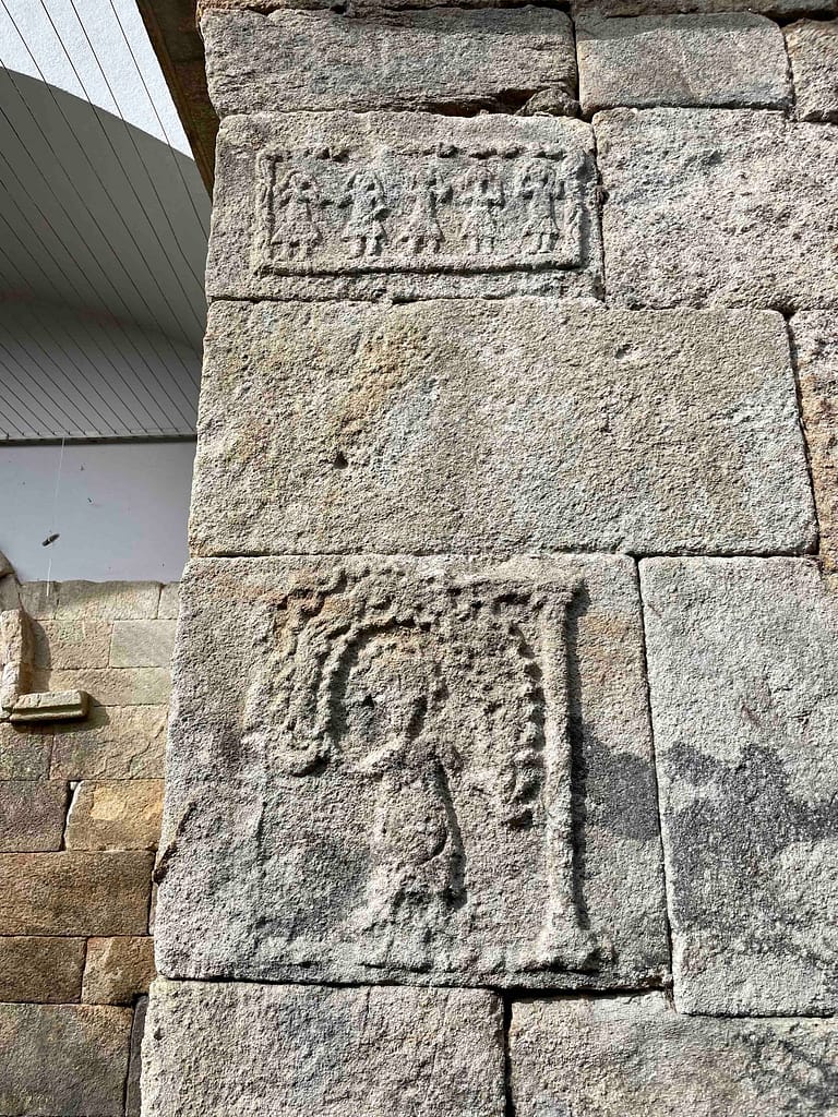(paired) fertility related carvings on the exterior wall of the temple - female